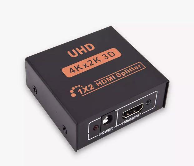 HDMI Splitter with Power Supply Adapter (Category: Cables & Adaptors) located in Manila. Submitted by jmedv (Listing ID 1074880924, Image 3). Description: “TKK 1 in 2 out 3D 4Kx2K 1x2 Port HDMI Splitter Repeater Amplifier with Power Supply Adapter” Brand new. Still comes with the box, it’s packaging, everything. Only took it out of its box to test with computer. Works 100%. Absolutely mirrors hdmi signal between two monitors. RFS: not the compute