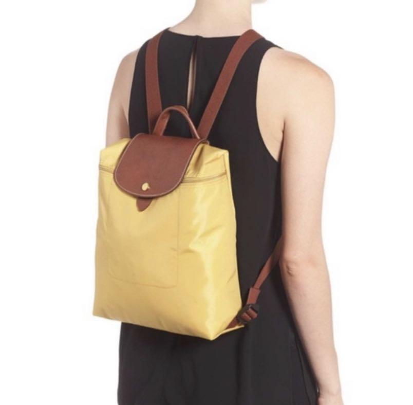 longchamp yellow backpack Cinosural International School