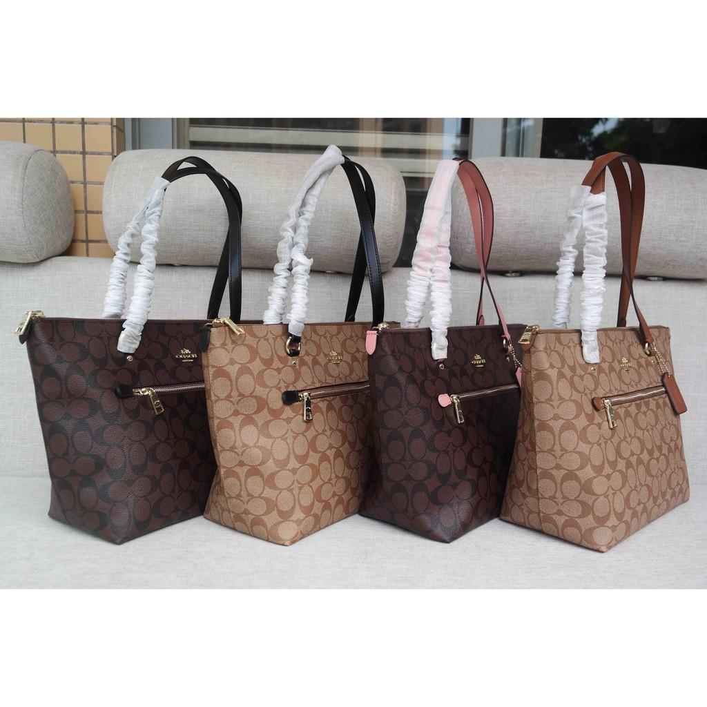 coach gallery signature tote Cinosural International School