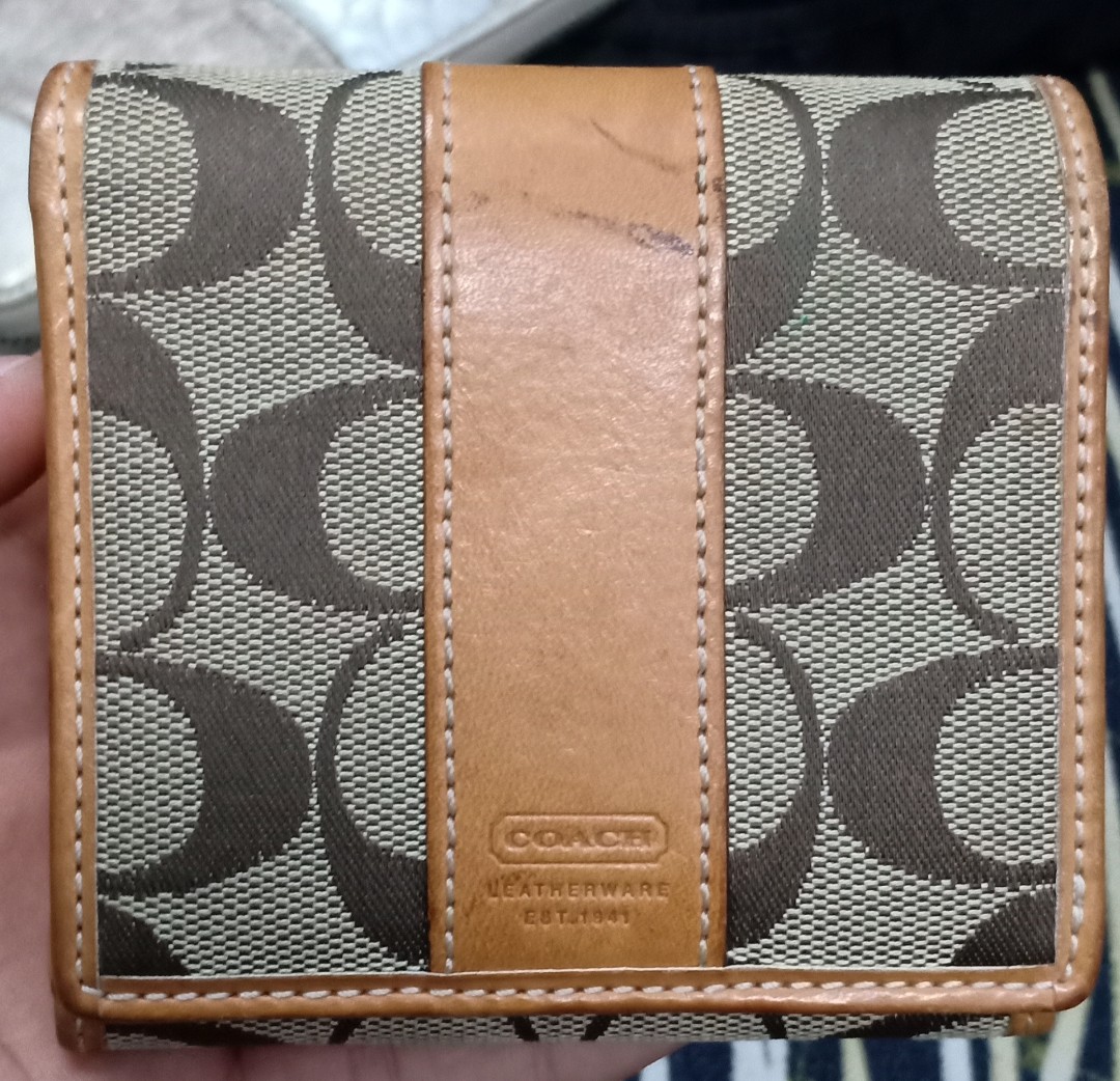 Are coach wallets made in china clearance