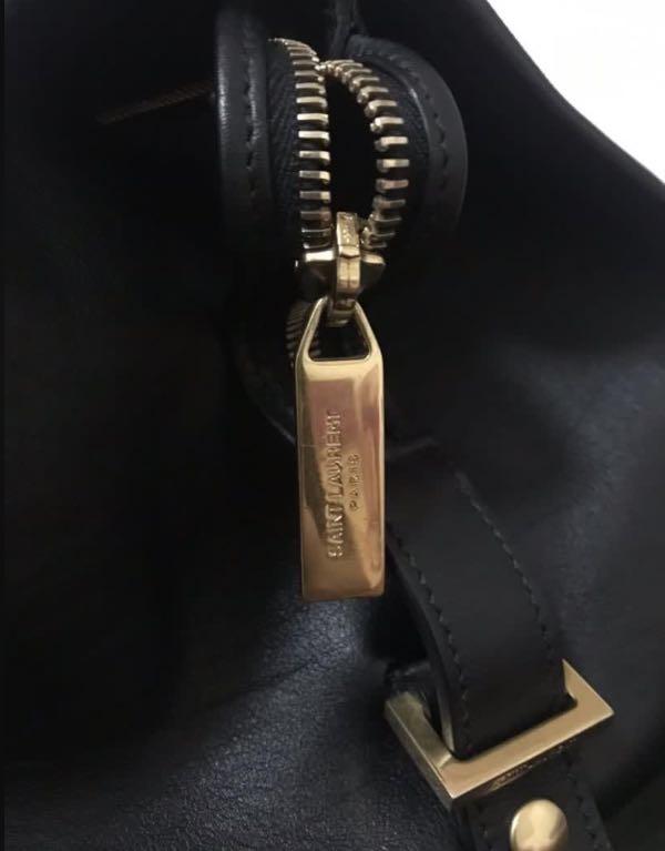 YSL Sac Ligne Y (Medium) (Category: Luxury Bags & Wallets) located in Quezon City. Submitted by kimhailey (Listing ID 1075342128, Image 3). Description: Authentic💯 excellent condtion 9/10 with a little scratch complete set with cards & dustbag RFS: decluttering.