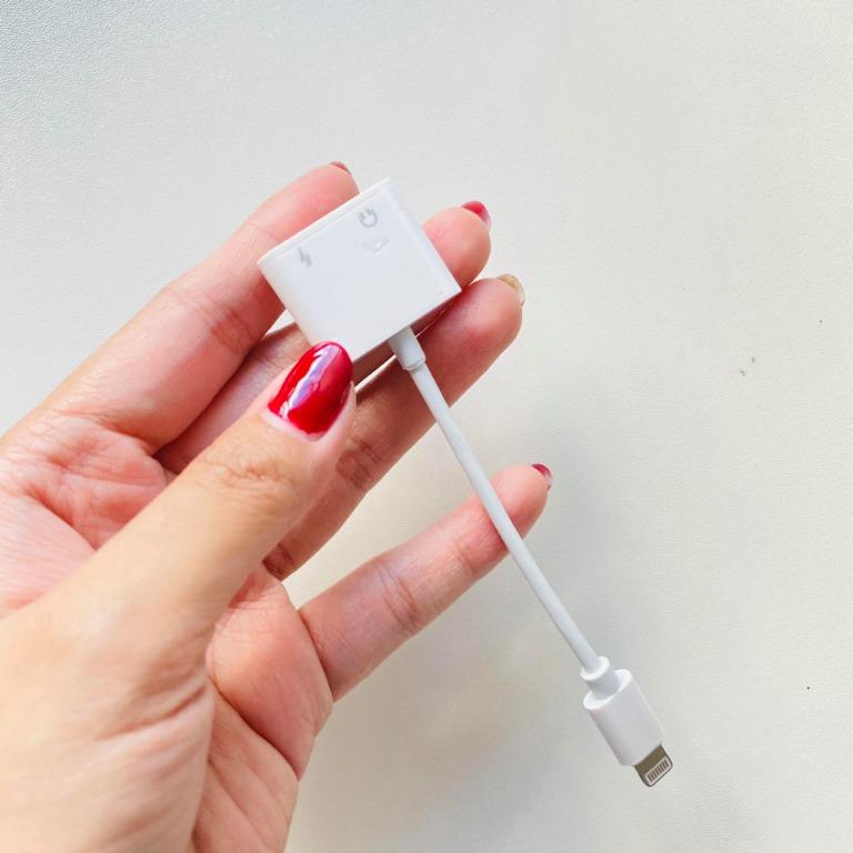 iPhone Dual Lightning Ports Audio & Charge Adapter Splitter (Category: Cables & Adaptors) located in Rizal. Submitted by decluttercornerph (Listing ID 1075537945, Image 1). Description: This item doesn’t support Call, only for enjoying music. DUAL LIGHTNING PORT FOR CHARGING AND MUSIC AT THE SAME TIME. Bought this from shopee RFS: bought the wrong item with plastic cover on the adaptor pa.