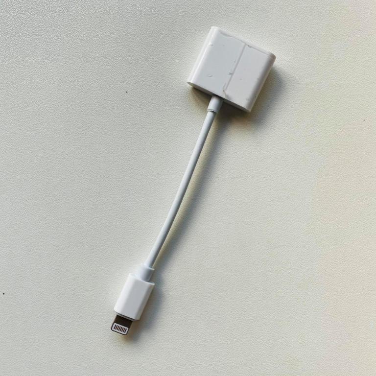 iPhone Dual Lightning Ports Audio & Charge Adapter Splitter (Category: Cables & Adaptors) located in Rizal. Submitted by decluttercornerph (Listing ID 1075537945, Image 2). Description: This item doesn’t support Call, only for enjoying music. DUAL LIGHTNING PORT FOR CHARGING AND MUSIC AT THE SAME TIME. Bought this from shopee RFS: bought the wrong item with plastic cover on the adaptor pa.