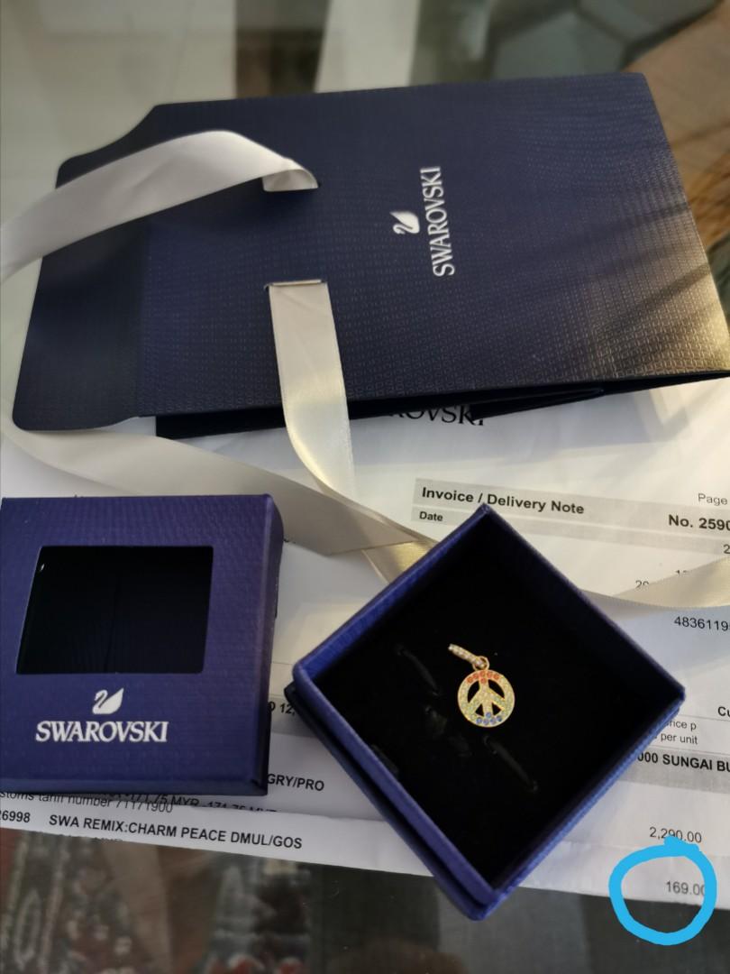 Swarovski online peace charm