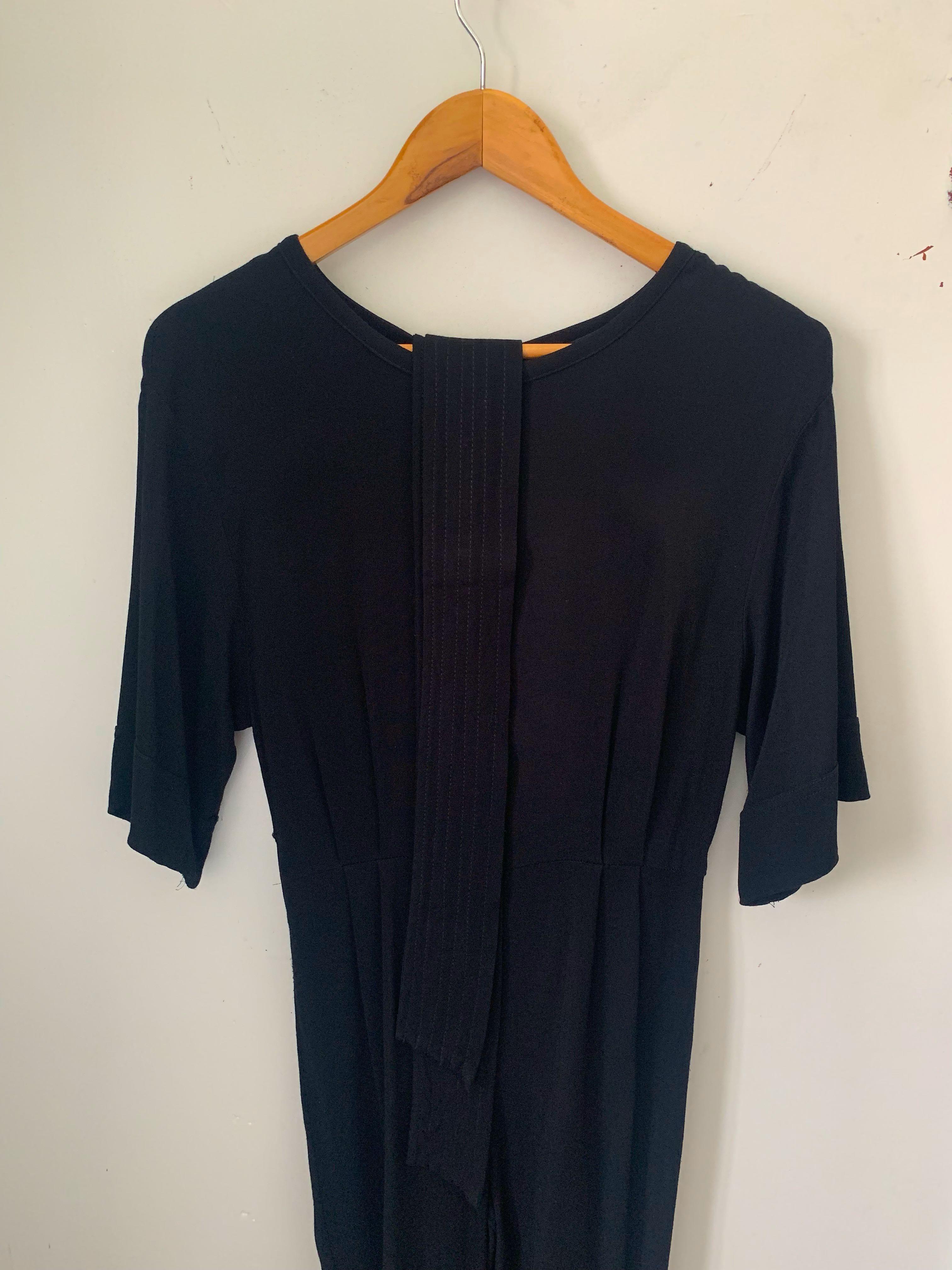 TOPSHOP BLACK JUMPSUIT (Category: Jumpsuits) located in Cavite. Submitted by istinej (Listing ID 1075611815, Image 1). Description: can fit S-M bought in SG.