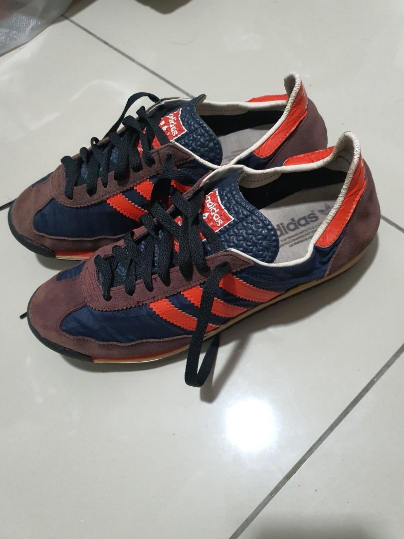 Adidas jeans navy orange hot sale