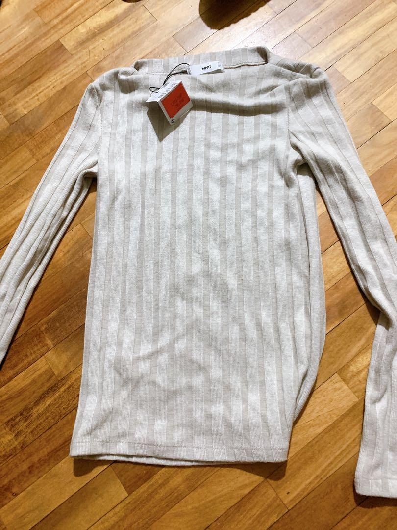 Mango long sleeves top (Category: Blouses) located in Makati City. Submitted by celers (Listing ID 1075879163, Image 3). Description: Bought for 795 on sale NEVER USED due to wrong size.