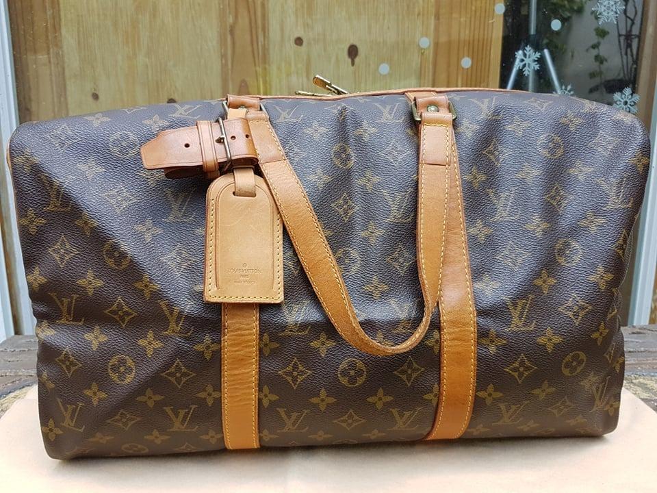 Sac souple cloth travel bag Louis Vuitton Brown in Cloth - 27465909