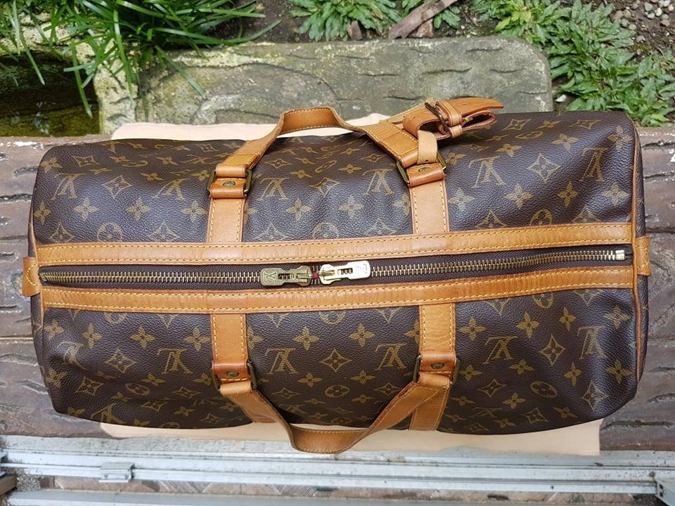 Sac souple cloth travel bag Louis Vuitton Brown in Cloth - 27474152