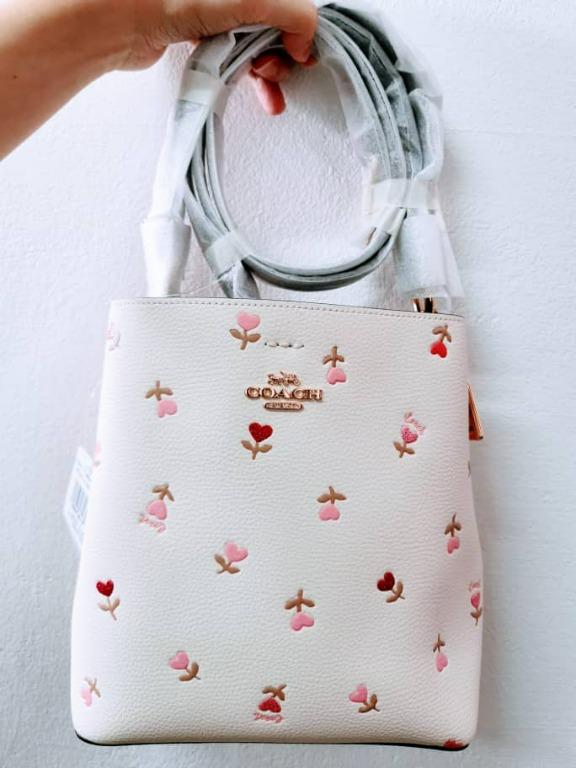 Coach small town bucket bag with heart floral print best sale
