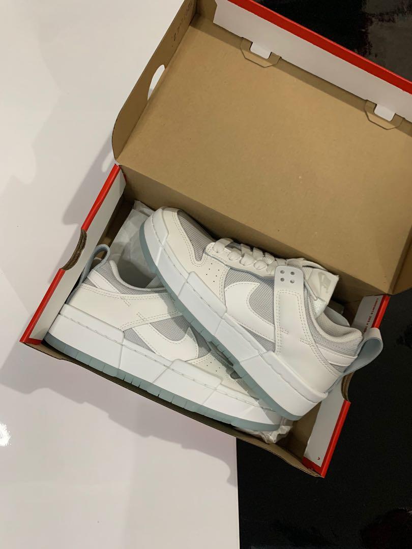 nike dunk low disrupt photon dust on feet