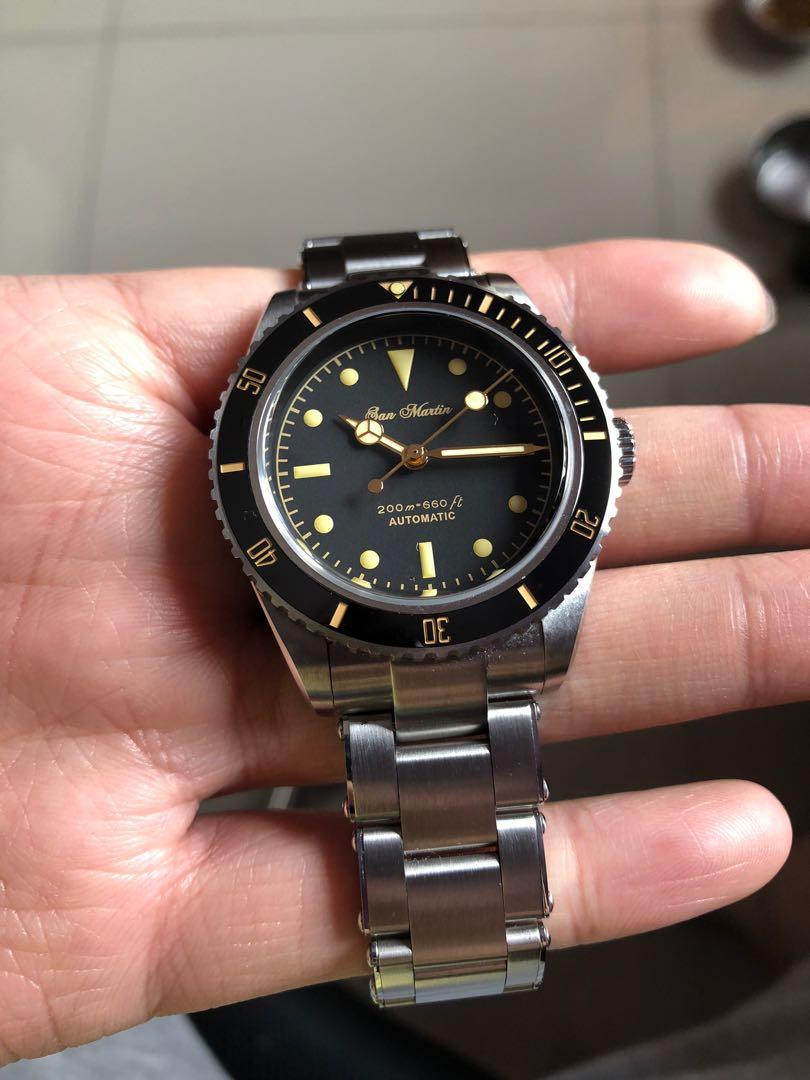 San Martin Homage Rolex, Fesyen Pria 