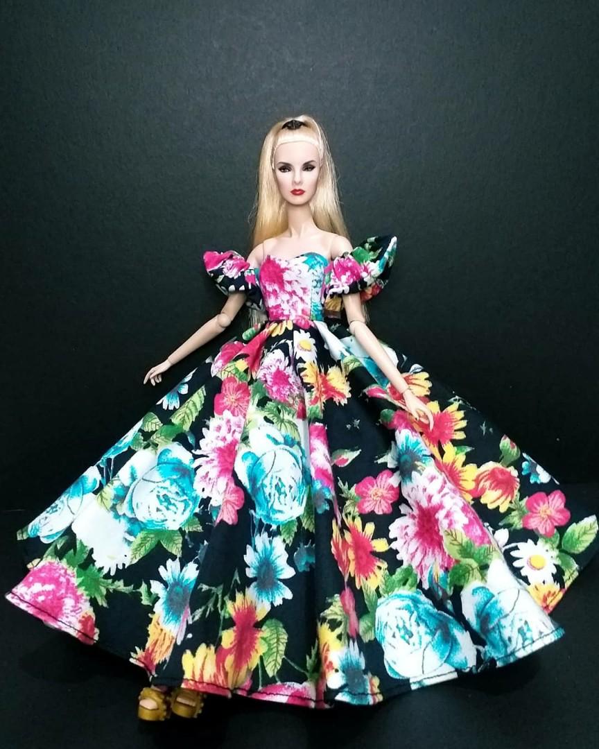 Close-up of Barbie wearing elegant red … – License image – 10230295 ❘ Image  Professionals