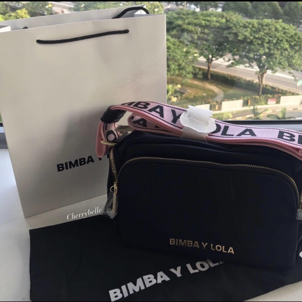 Bimba y Lola Crossbody Bag with lettering pink strap