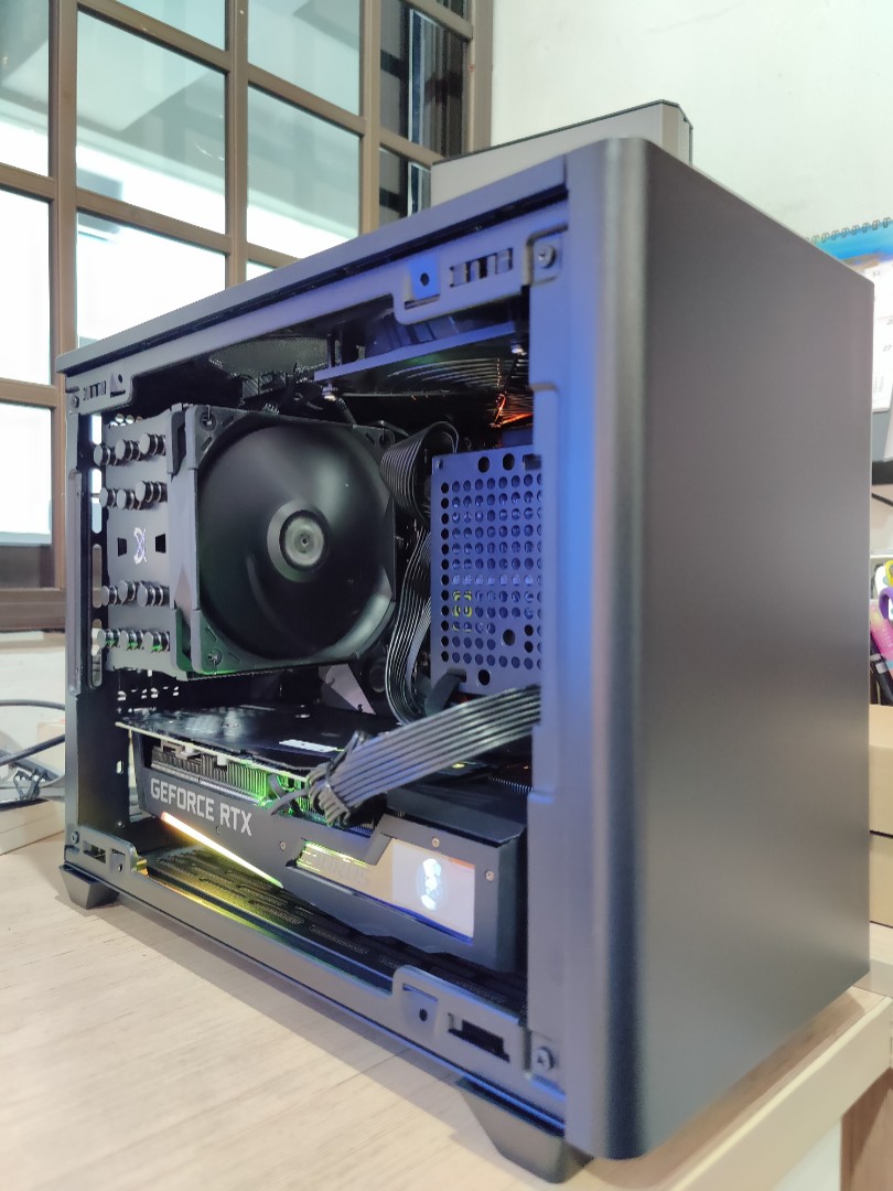 SFX small form factor custom gaming pc featuring NR200P, Ryzen and rtx