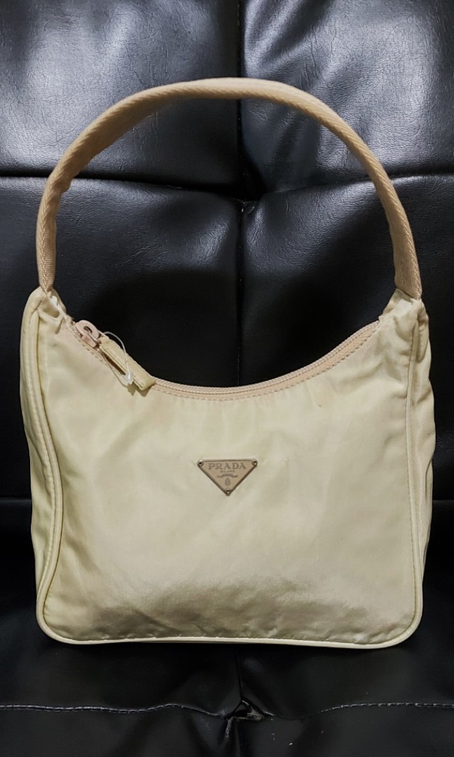 Vintage prada nylon mini hobo bag beige, Women's Fashion, Bags & Wallets,  Shoulder Bags on Carousell