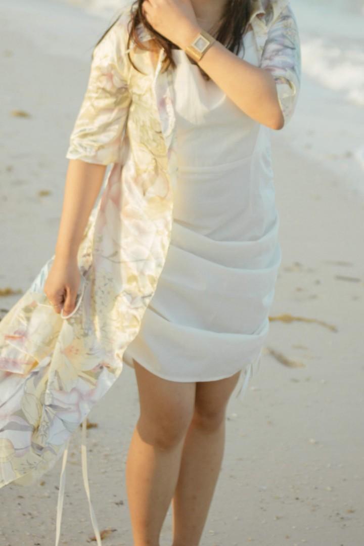 White Semi-cowl Ruched Dress (adjustable length) (Category: Dresses) located in Manila. Submitted by bkcee (Listing ID 273853811, Image 3). Description: NEW AND UNUSED (Used for when worn photo only) *Adjustable straps *Bust: 32-36" *Waist: 13" (With thin garter at the back of the waist, fits 25-29/30") *Length: 40" (Adjustable side lengths - mini or midi) *Free size *Height on the photo: 4'11, waistline between 27-28 inches Perfect for XS-M fram