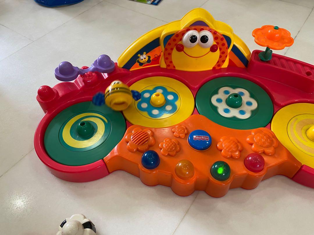 5 Fisher Price spinning toy
