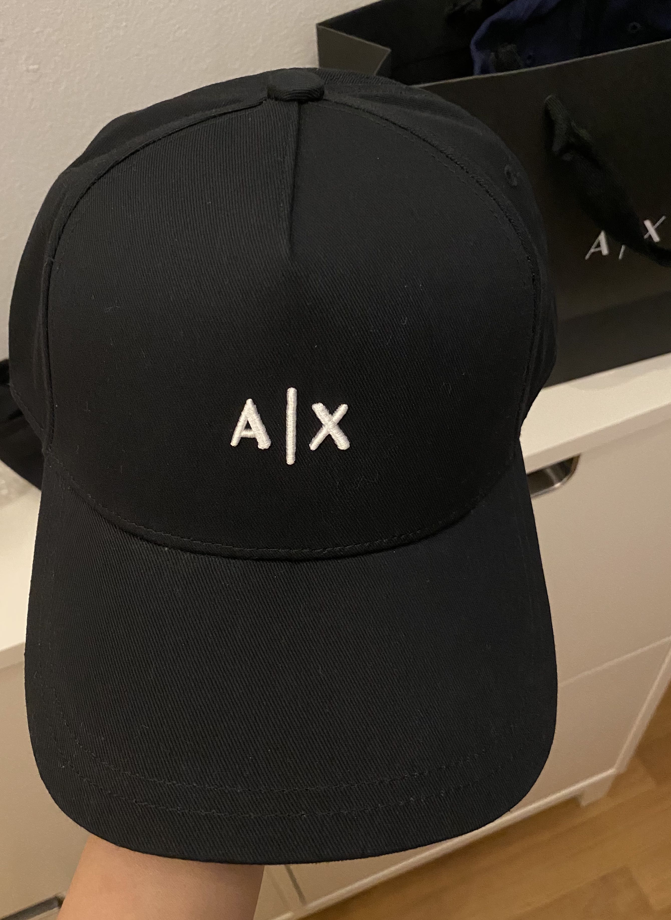 Armani Exchange Cap in Black colour, Men's Fashion, Watches & Accessories,  Cap & Hats on Carousell