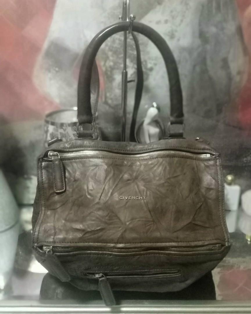 💜💕Givenchy Pandora Medium (Category: Luxury Bags & Wallets) located in Quezon City. Submitted by wheremyheart_is (Listing ID 1072678591, Image 3). Description: <item is available as long as posted> *very hard to come by, well-loved con.,sign of usage, minimal handle rubber lining rubs/scuffs hence selling low, genuine wrinkled sheep leather, ykk etched zippers with no.8 digit marking *pls.self authenticate..classy rugged carefree babe.