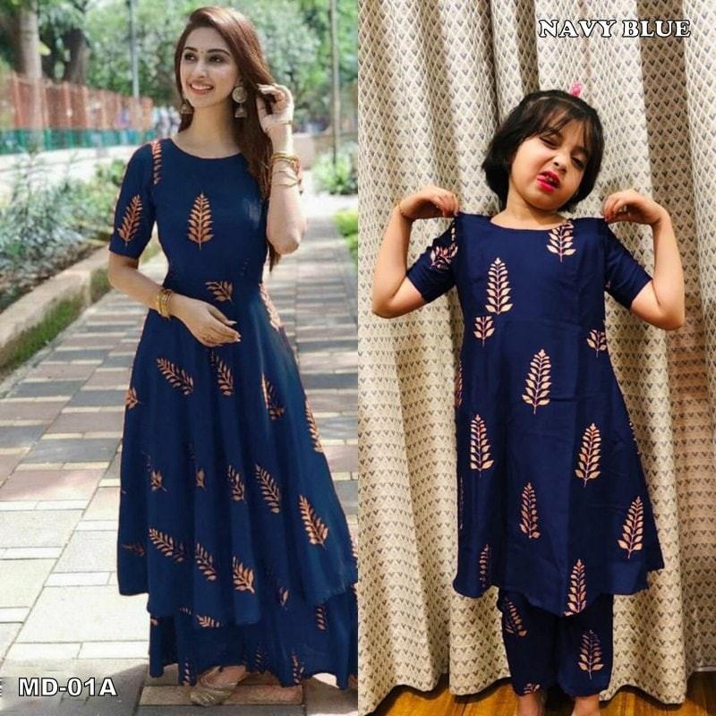 Ethnic wear mom and new arrivals daughter
