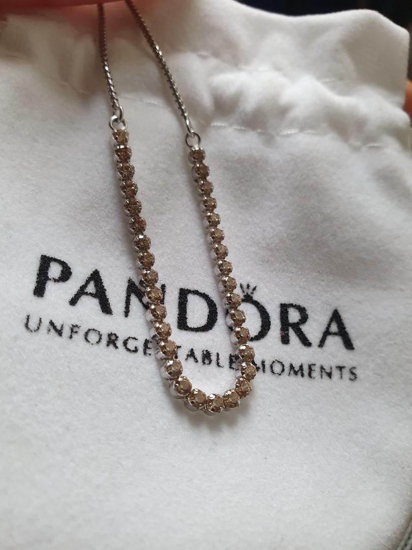 Pandora Golden Sparkling Strand Bracelet, Women'S Fashion, Jewelry &  Organisers, Bracelets On Carousell