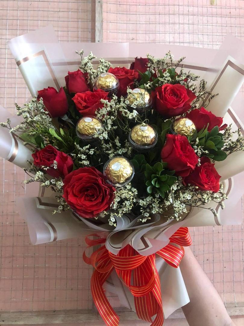 1 DOZEN ROSES WITH 6PCS FERRERO (Category: Flowers & Bouquets) located in Quezon City. Submitted by daflowershop (Listing ID 1076666183, Image 1). Description: We also have other fresh and dried flowers you can directly mssg me..