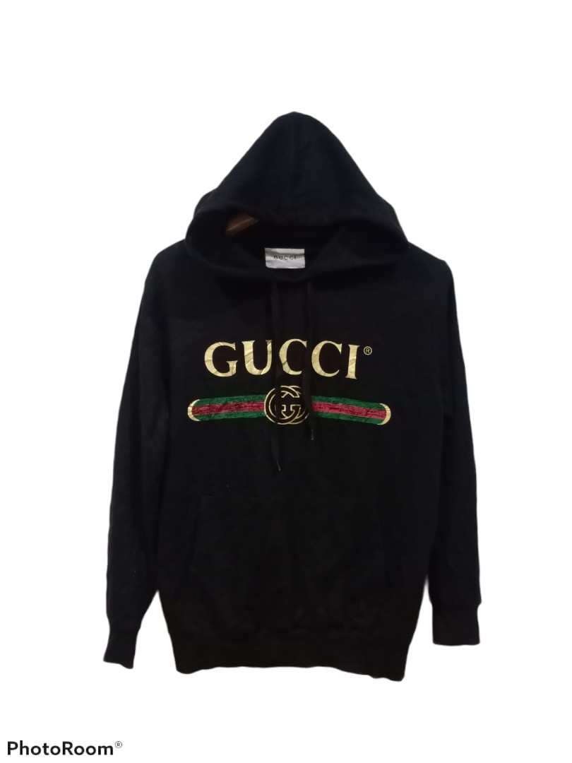 Champion sweater fake sale vs real gucci