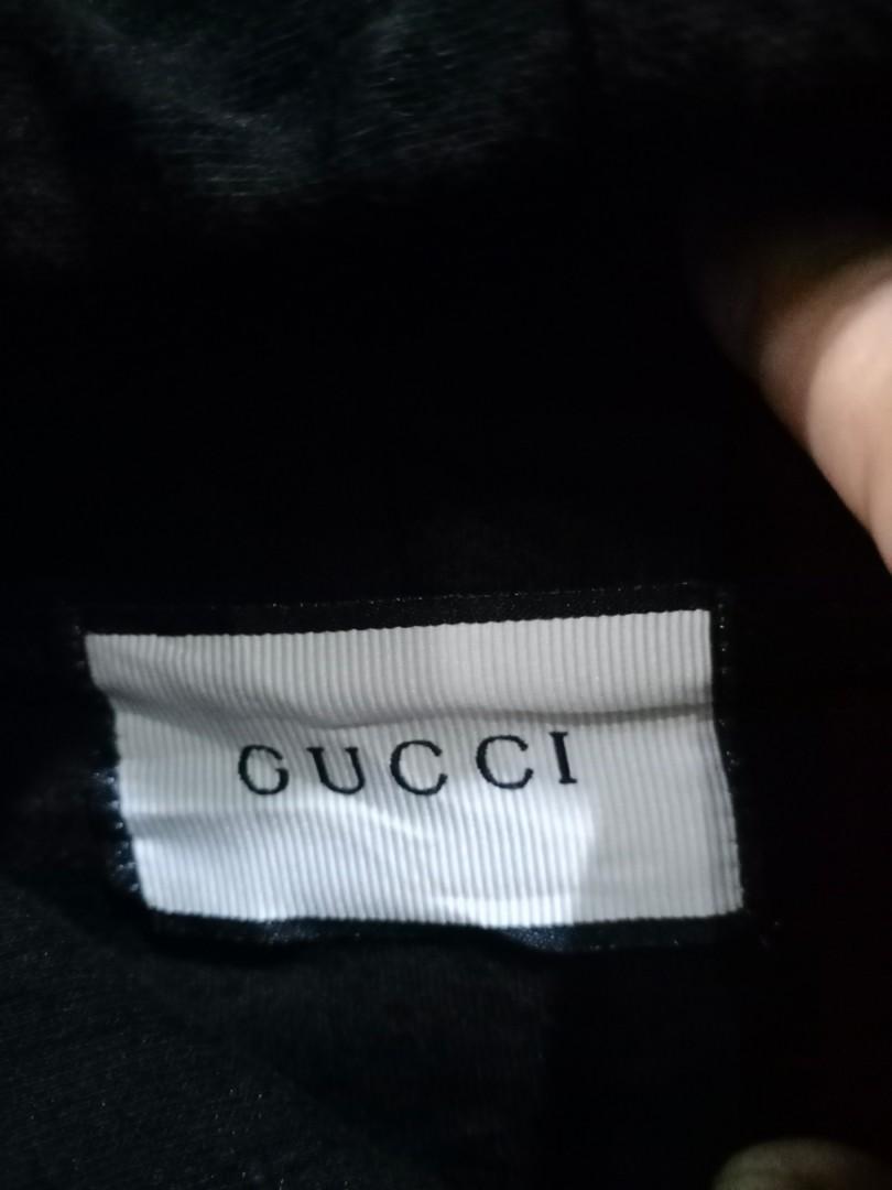 Gucci champion discount hoodie fake