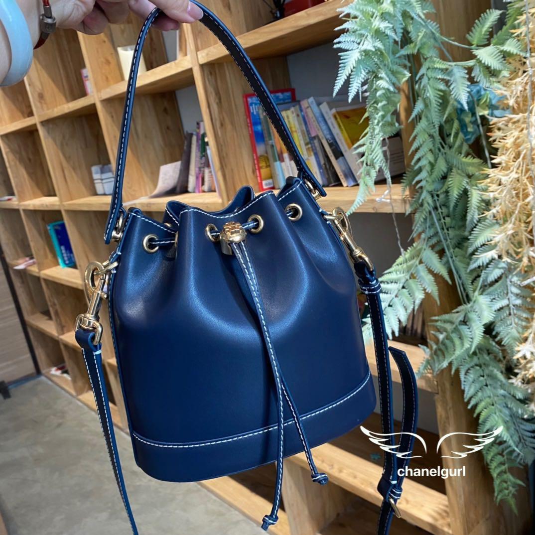 New Design | Tory Burch T Monogram Leather Bucket Bag Dark Blue Navy  Leather, Women's Fashion, Bags & Wallets, Purses & Pouches on Carousell