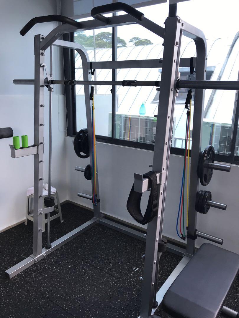 Smith machine with pull up bar outlet