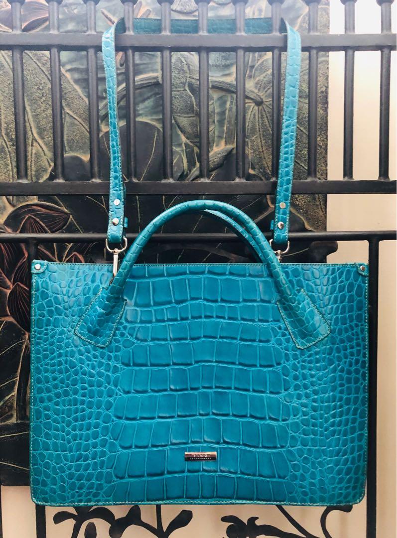 Authentic leather preloved fino bag (Category: Luxury Bags & Wallets) located in Quezon City. Submitted by ajprelovedlies (Listing ID 1076799331, Image 2). Description: Preloved authentic Fino leather bag. In excellent condition (like new) With dustbag. Shipping c/o buyer..