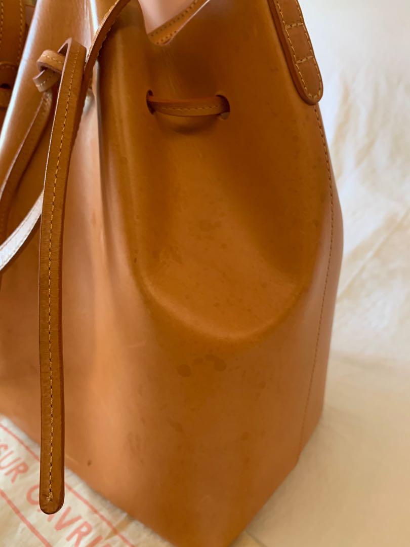Authentic Mansur Gavriel Bucket Bag (Category: Luxury Bags & Wallets) located in Manila. Submitted by jules_chiong (Listing ID 1076755023, Image 2). Description: Material: Leather Calf Skin (inside color light pink) With water marks (as shown in the photo) at the front and sides. But back is still nice. With minor scratches (as shown in the photo) normal for calf leather goods. .