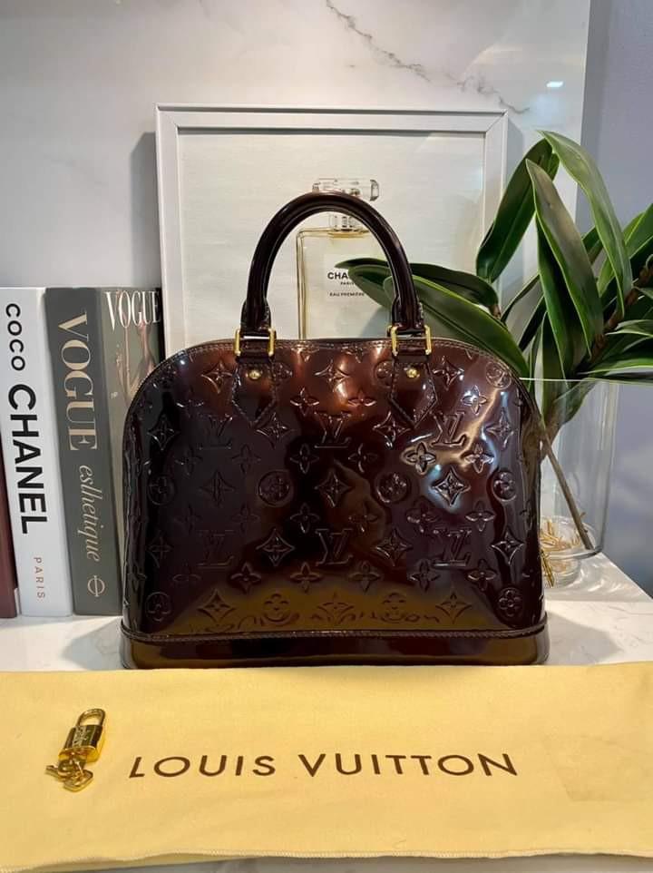 LV Alma MM in Vernis Amarante (Category: Luxury Bags & Wallets) located in Carmona. Submitted by bagislifeshop (Listing ID 1076841936, Image 2). Description: 100% Authentic LV Alma MM in Vernis Amarante Condition: 9/10 Comes with Dustbag and Lockset Disclaimer: All Products, Names, Brands, and Logos are owned by their respective brand owners. We are not affiliated with the Brand featured in this post..
