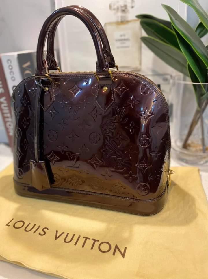 LV Alma MM in Vernis Amarante (Category: Luxury Bags & Wallets) located in Carmona. Submitted by bagislifeshop (Listing ID 1076841936, Image 3). Description: 100% Authentic LV Alma MM in Vernis Amarante Condition: 9/10 Comes with Dustbag and Lockset Disclaimer: All Products, Names, Brands, and Logos are owned by their respective brand owners. We are not affiliated with the Brand featured in this post..