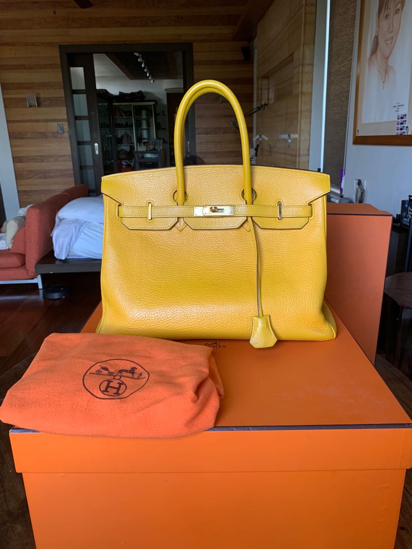 A classic gold personalized Birkin with playful pop yellow stitching!