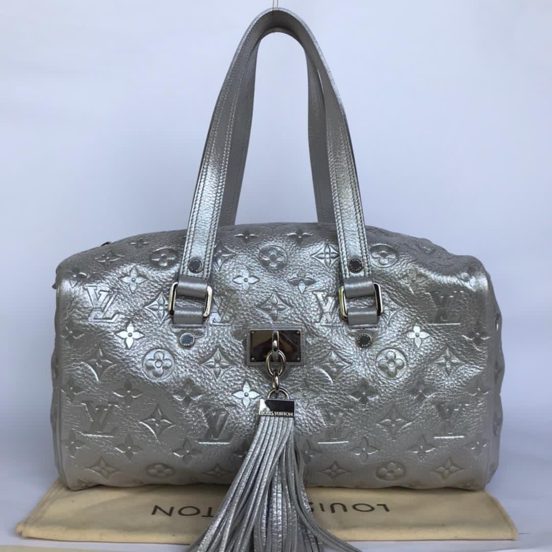 Louis Vuitton Comette Bag