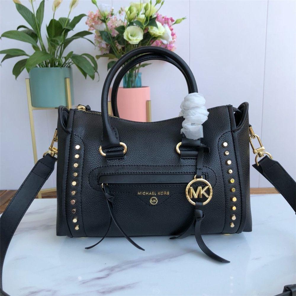 AUTHENTIC MICHAEL KORS CARINE SMALL STUDDED PEBBLED LEATHER, Women's  Fashion, Bags & Wallets, Purses & Pouches on Carousell