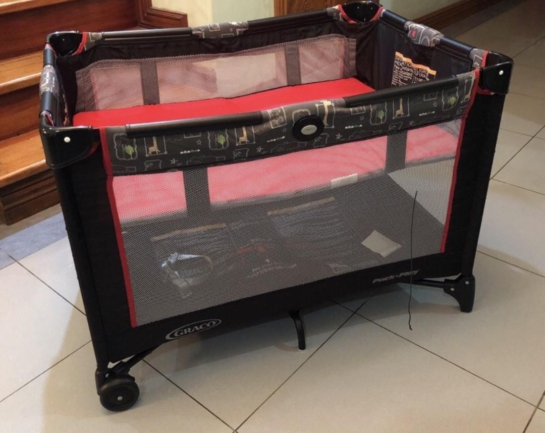 Graco folding hot sale crib