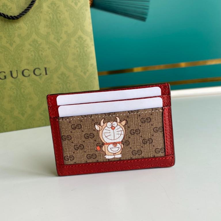 gucci doraemon pouch