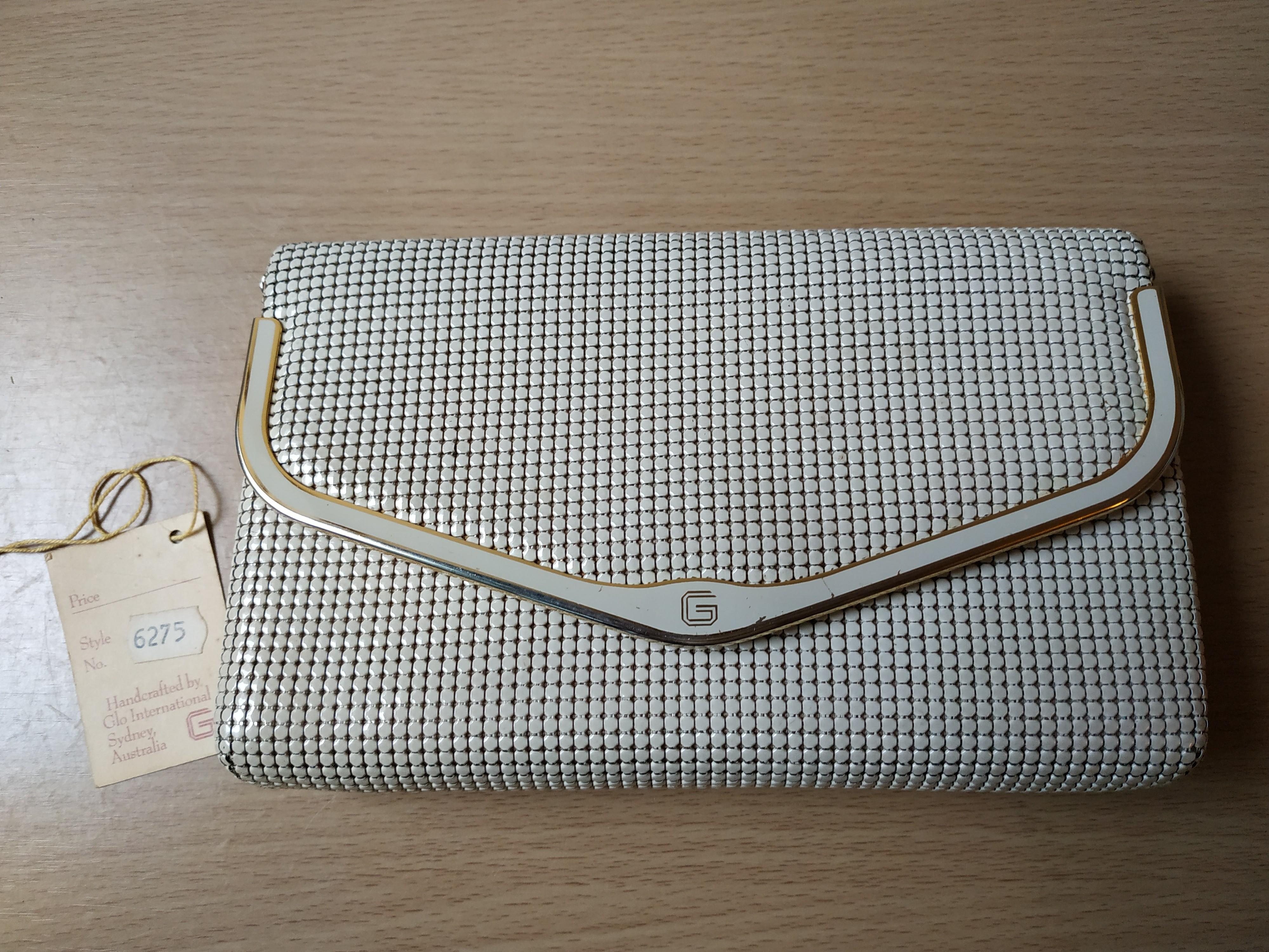 Glomesh clutch online