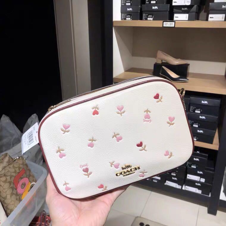jes crossbody in signature canvas with heart floral print