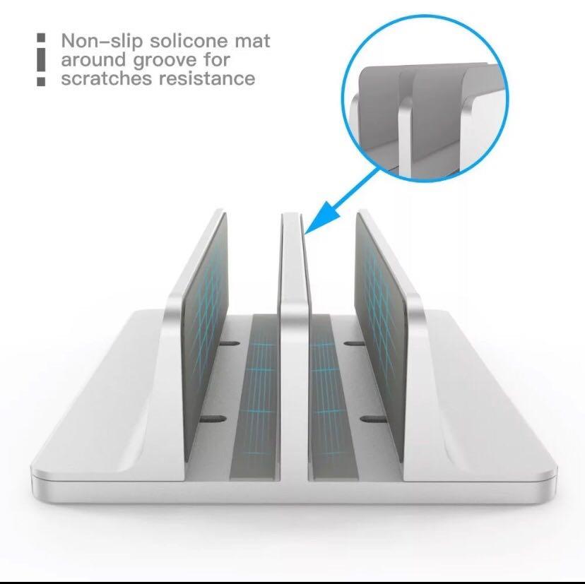 Vertical Laptop Stand - Double Adjustable (Category: Other Accessories) located in Quezon City. Submitted by edether (Listing ID 1077275050, Image 2). Description: * Updated Dock Version: Double dock stand suitable for two laptops like MacBook, Samsung, Microsoft Surface and more. * Adjustable Size: Adjustable width compatible with various laptops or the thickness of notebooks varying from 0.55in / 14mm to 1.65in / 42mm. * Protective Mat: Non-tox