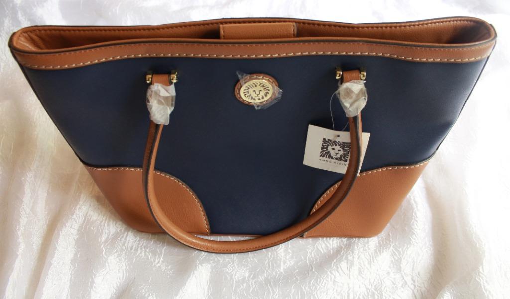 Anne Klein - Bag and wallet set (Category: Luxury Bags & Wallets) located in Pasig City. Submitted by variethings (Listing ID 1077626731, Image 3). Description: Bag and wallet Brand: Anne Klein A terno of big-sized bag and wallet where you can put in a lot. *Selling it because - not in to big bags NEW with tag, not used. But kindly note that there are some peelings (refer to photo) maybe it can be remedied thru a leather store Bought for the pric