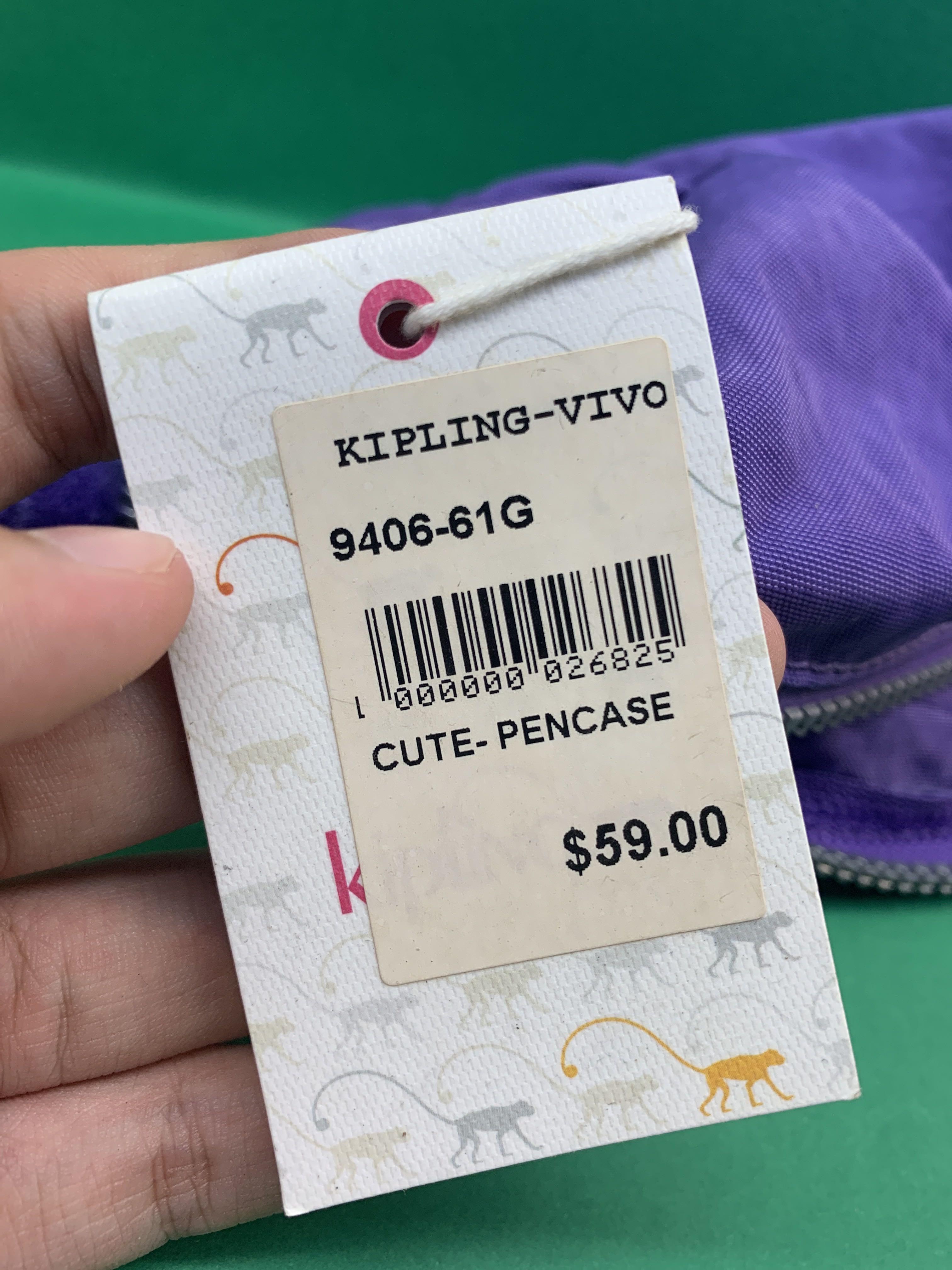 Kipling Pouch (Category: Stationery & School Supplies) located in Singapore. Submitted by lee_mainchar (Listing ID 245800436, Image 6). Description: - New and unused - Price tag is still on - Vivid purple - Suitable to use as pencil case or make up pouch - Cute monkey keychain just like all Kipling products - Zips are all in perfect working conditions Feel free to ask me more about the conditions or photos of the product .