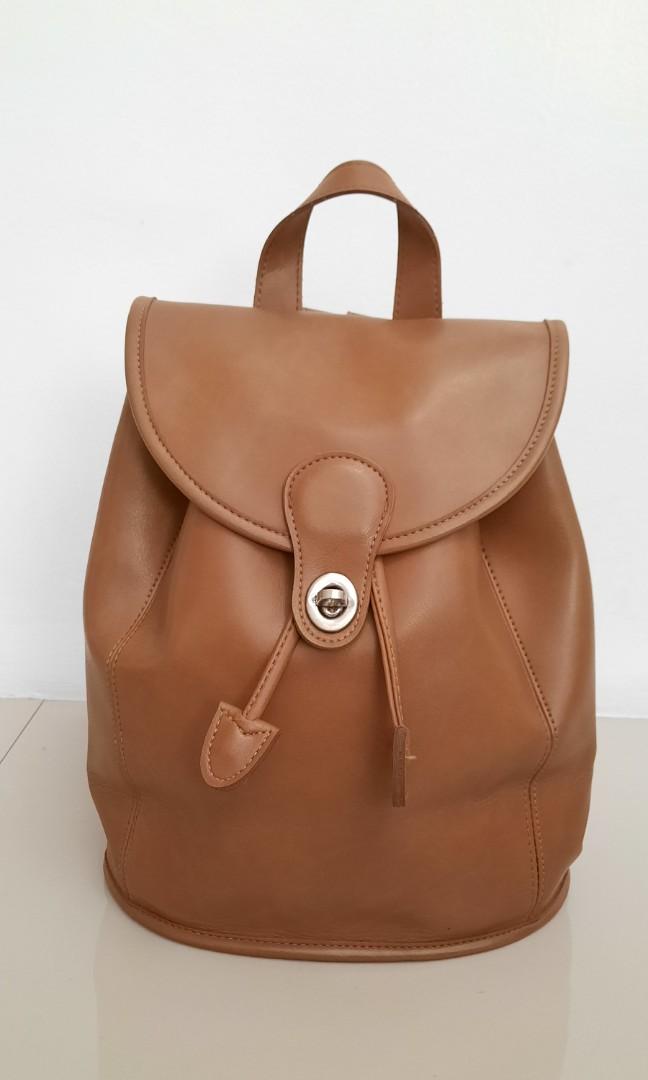 second hand leather backpack
