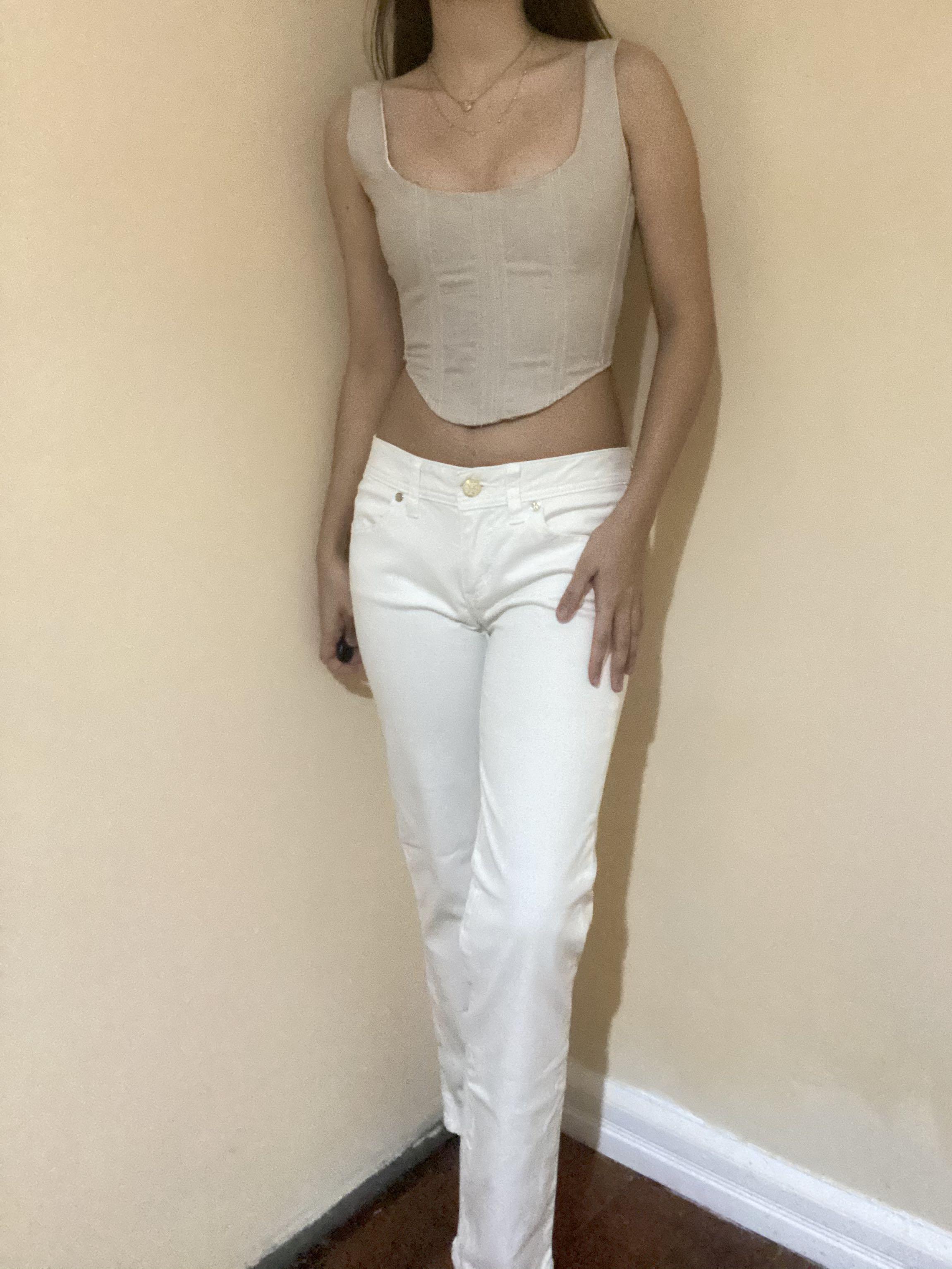 Tory Burch White denim pants (Category: Luxury Apparel) located in Las Pinas. Submitted by tbclo (Listing ID 1077642410, Image 3). Description: BNWOT Originally $250 dollars The denim is high quality and luxe Size 26 Fits small Cropped style RFS: not my style I’m also selling the corset! I’ll give discounts if multiple items are bought ☺️.