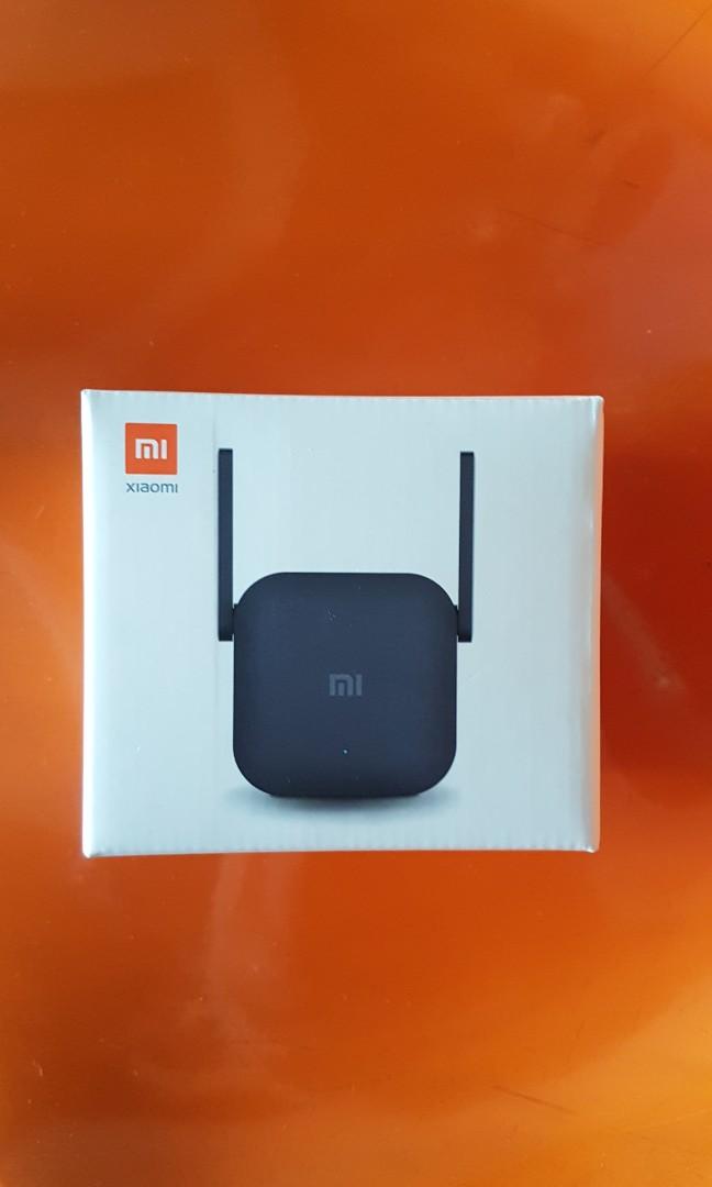 WIFI REPEATER PRO (Category: Networking) located in Quezon City. Submitted by wavetek23 (Listing ID 1077702770, Image 1). Description: mi Brand 300Mbps upto 64 devices dual 2.4Ghz 100-240v.