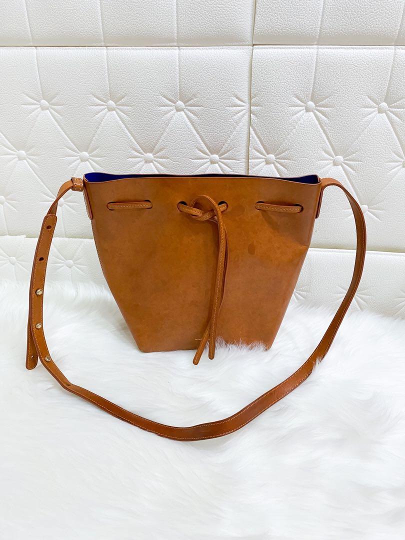 AUTHENTIC Mansur Gavriel Brown Bucket Bag (Category: Luxury Bags & Wallets) located in Quezon City. Submitted by closetofcoco (Listing ID 1077884201, Image 1). Description: GUARANTEED AUTHENTIC PM for inquiries Almost unused Kept in storage Available for Layaway DISCLAIMER: We are not affiliated or associated with any of the brands featured. All copyrights reserved to the respective original brand holders. .