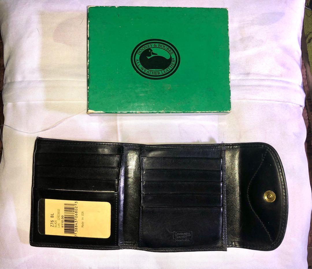 Authentic Vintage Dooney & Bourke Kisslock Bifold Wallet (Category: Luxury Bags & Wallets) located in Quezon City. Submitted by msiscloset (Listing ID 1077790983, Image 2). Description: Complete with box and papers With kiss lock coins compartment With 2 divisions for paper bills With 8 card slots With picture slot With 2 slip compartments #authenticdooneyandbourkewallet #blackbifoldwallet #dooney&bourke .